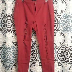 Red denim distressed jeans.